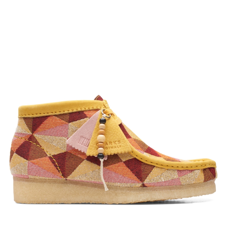 Gelber Kombi-wallabee-stiefel Clarks