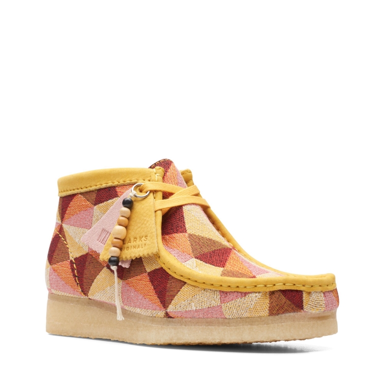 Gelber Kombi-wallabee-stiefel Clarks