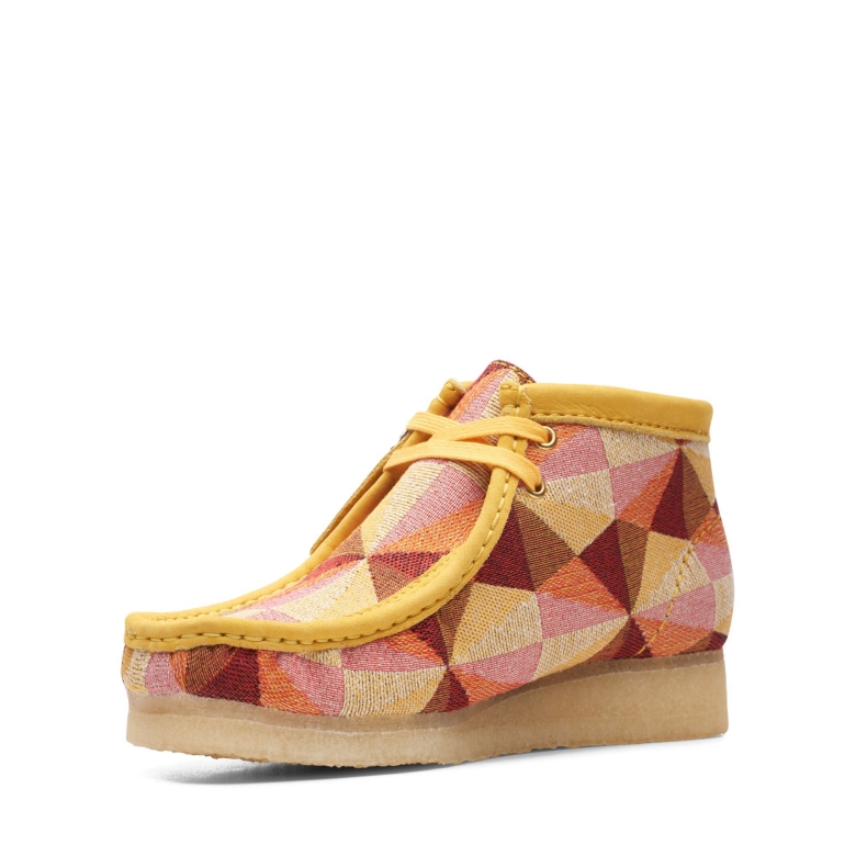 Gelber Kombi-wallabee-stiefel Clarks